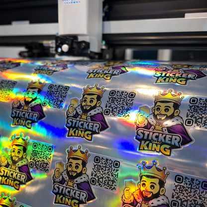 Holographic stickers with 'Sticker King' branding on a reflective surface.